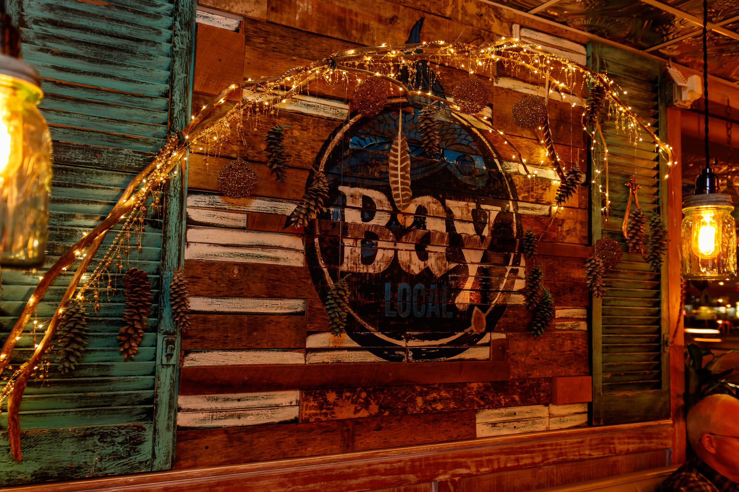 Bay Local logo on wood wall  